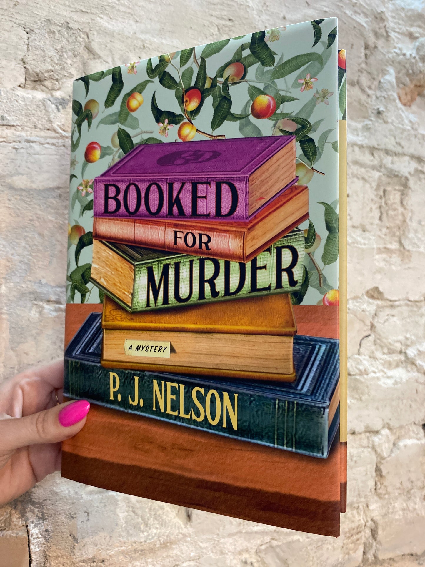Booked for Murder by P.J. Nelson (Hardcover) (Book 1)