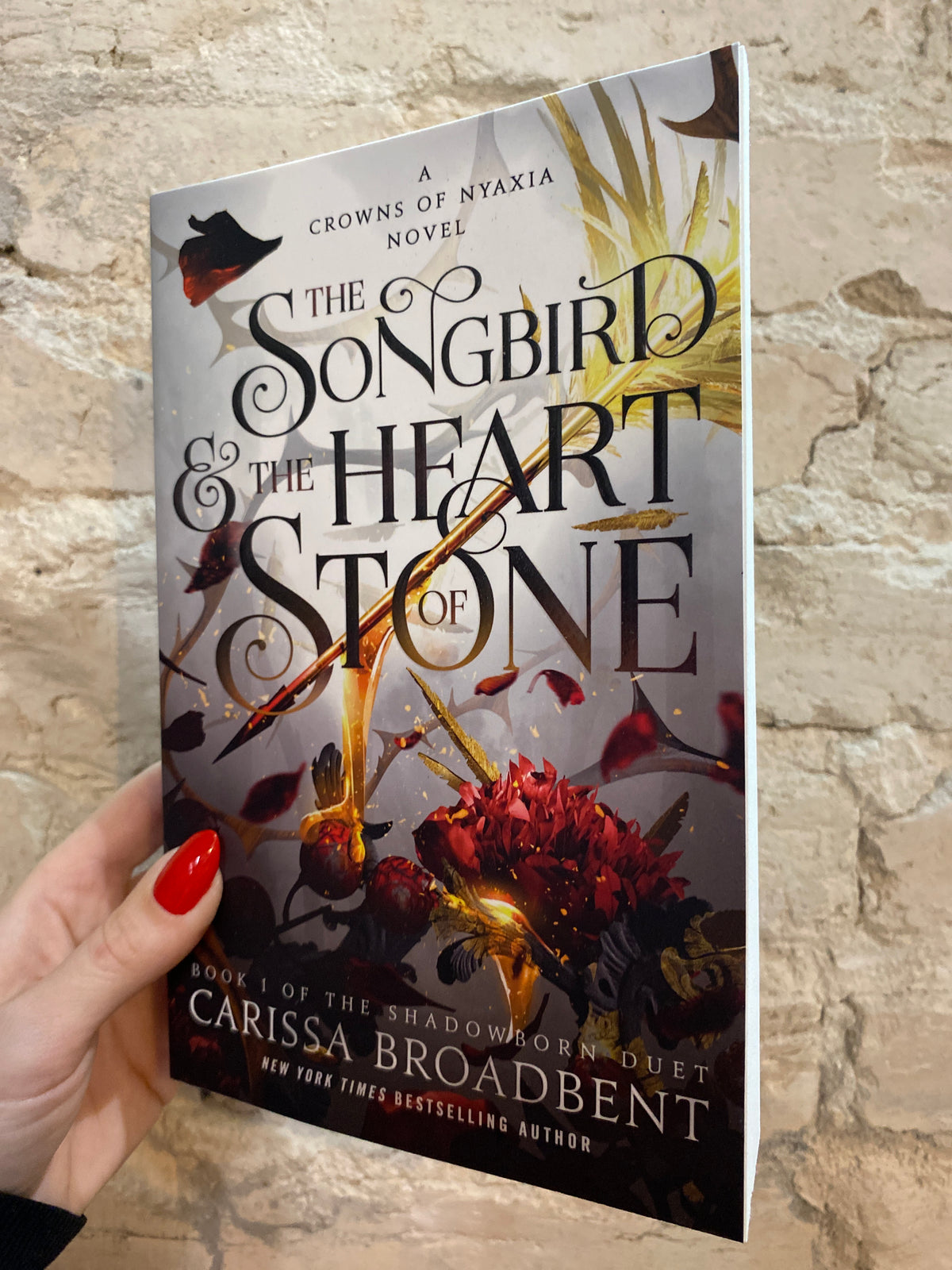 The Songbird & the Heart of Stone by Carissa Broadbent (Shadowborn Duet: Book 1)