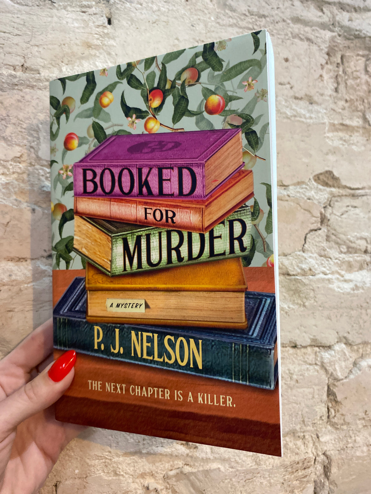 Booked for Murder by P.J. Nelson (Book 1)