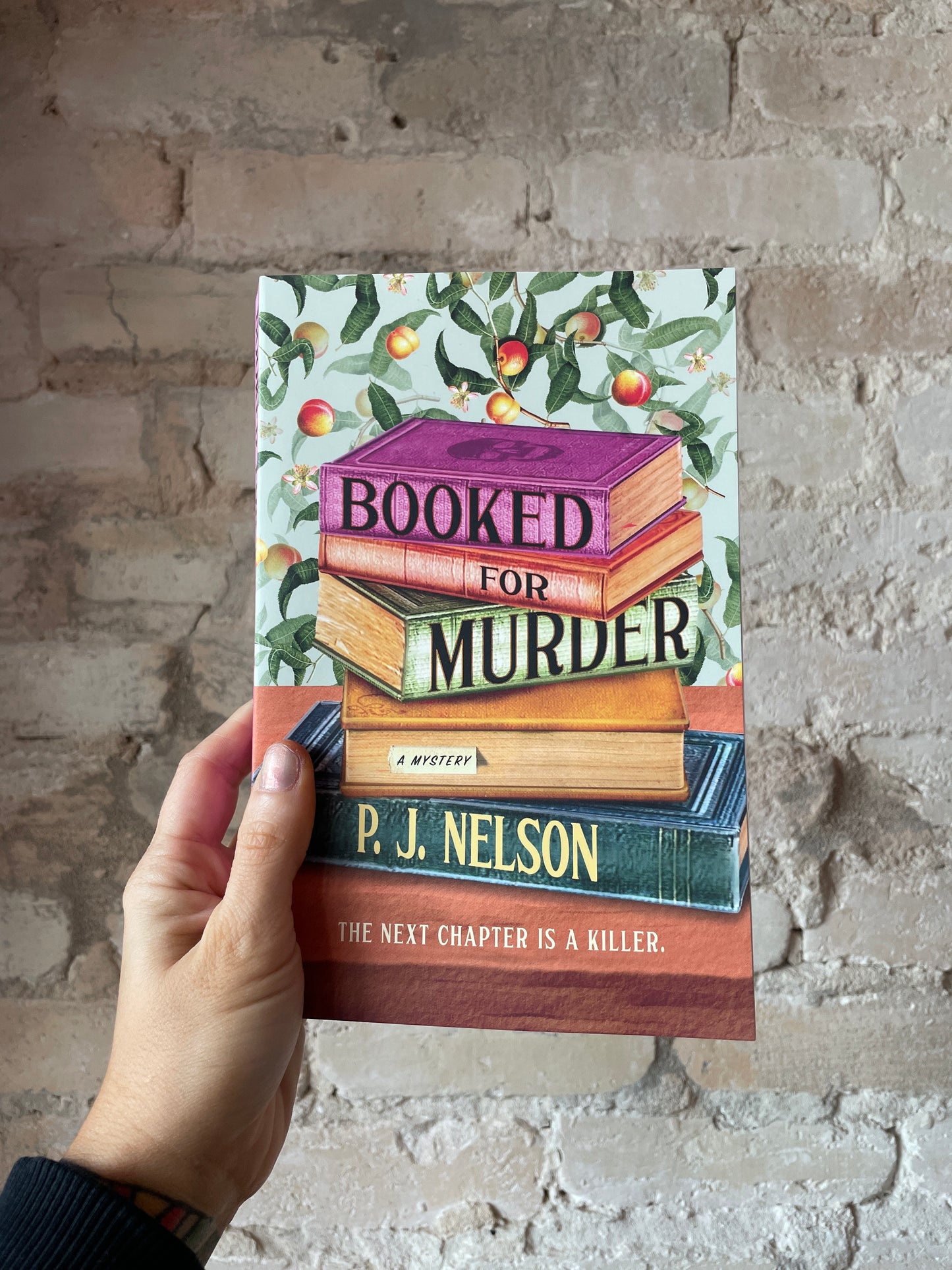 Booked for Murder by P.J. Nelson