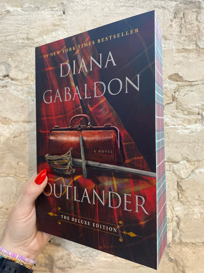 Outlander by Diana Gabaldon (Deluxe Paperback) *PREORDER*